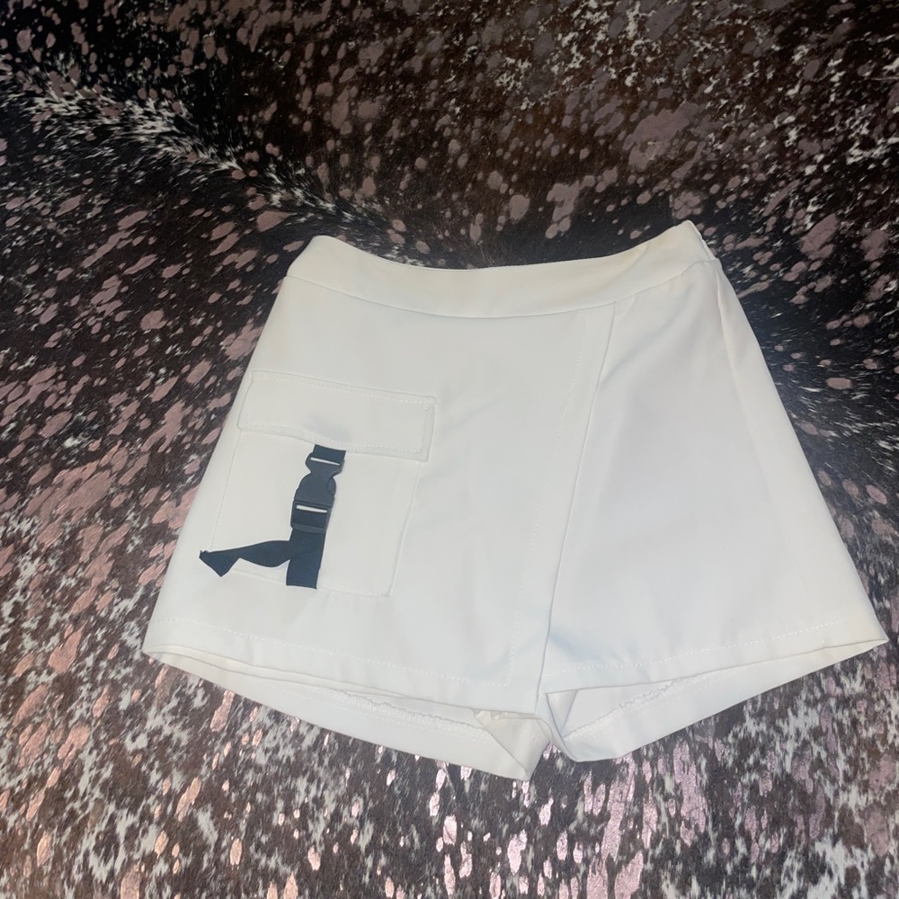 White skort with black buckle